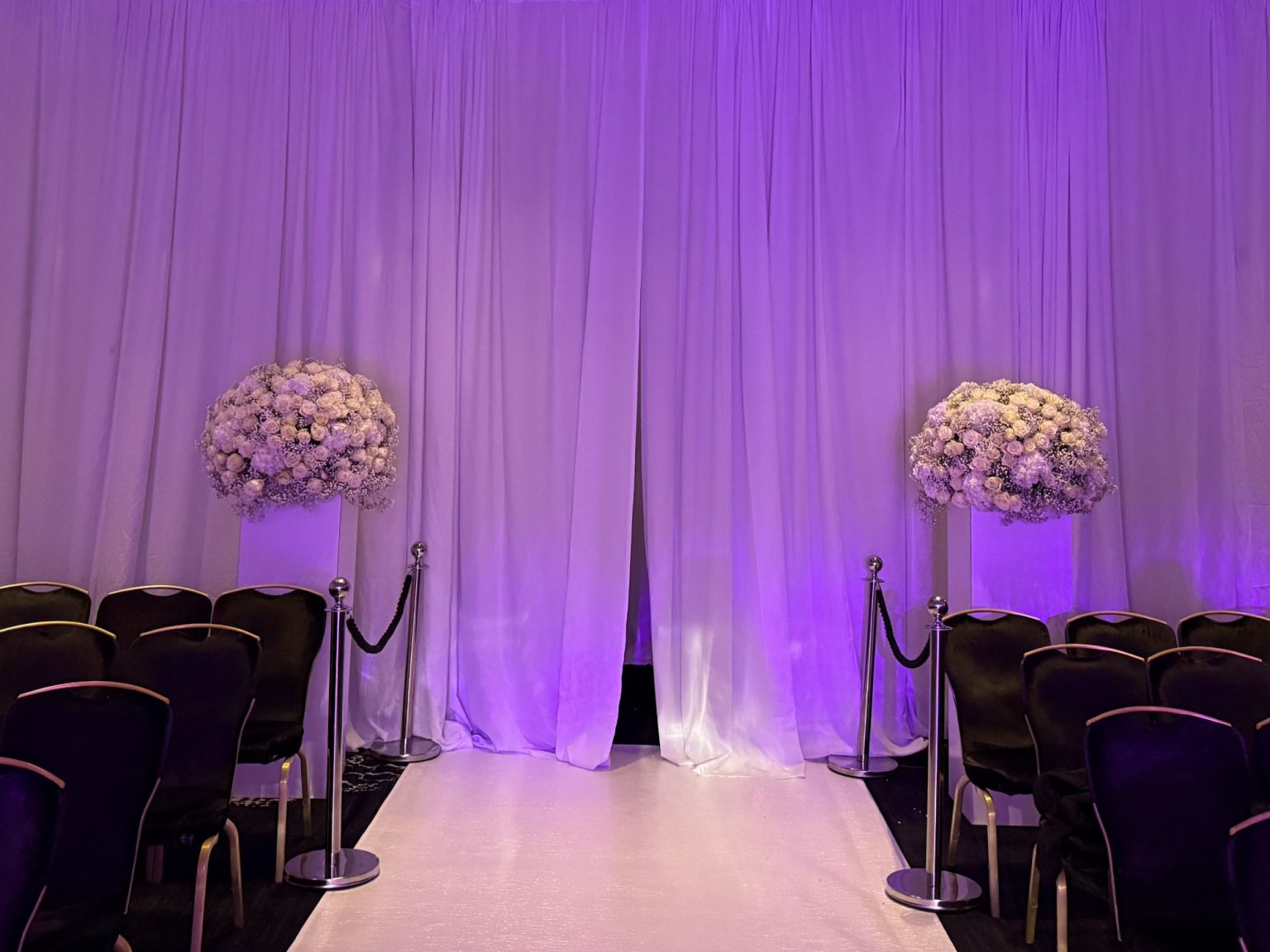 Radisson Edwardian - White draping, White aisle carpet & Rope and posts ...